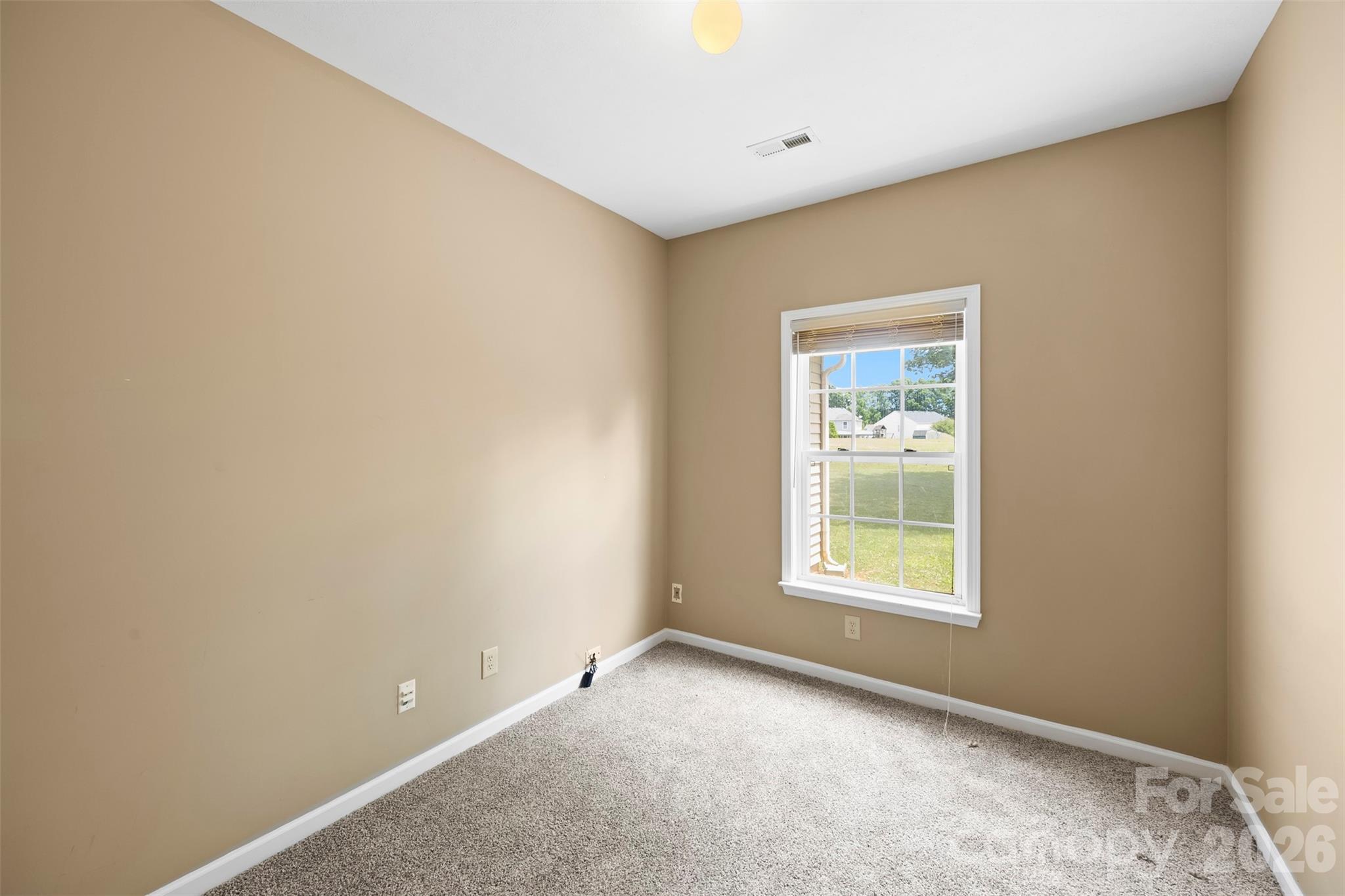 1720 Grove Tree Lane Clover, SC 29710 - Photo 17 of 43 a view of an empty room with a window