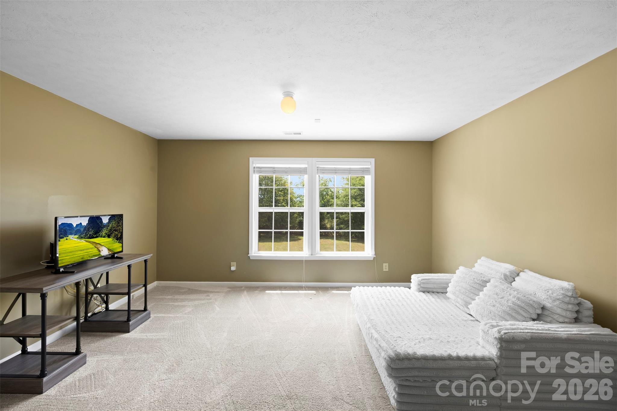 1720 Grove Tree Lane Clover, SC 29710 - Photo 22 of 43 a bedroom with a bed and a window