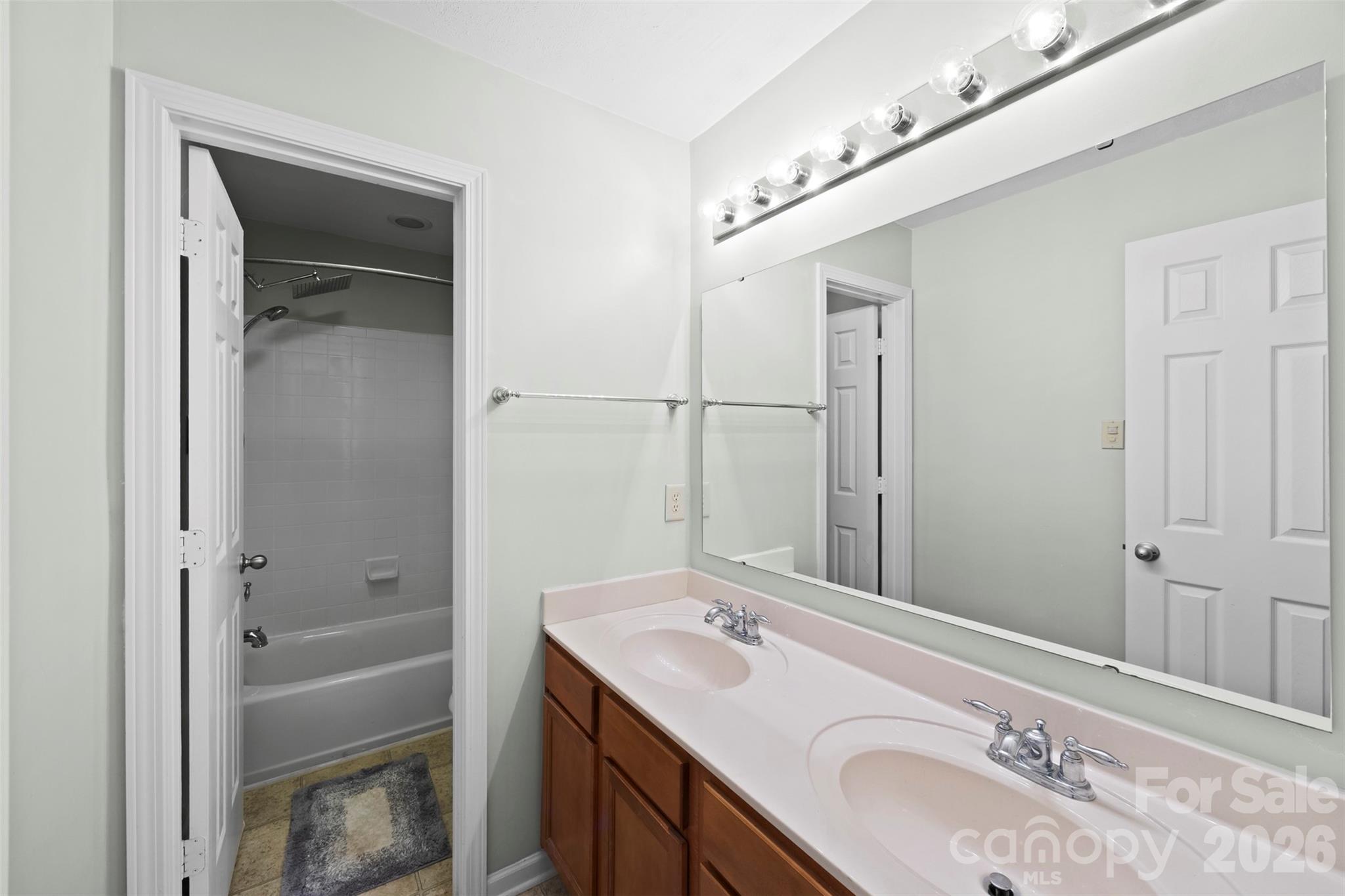 1720 Grove Tree Lane Clover, SC 29710 - Photo 24 of 43 a bathroom with a granite countertop sink shower and a mirror