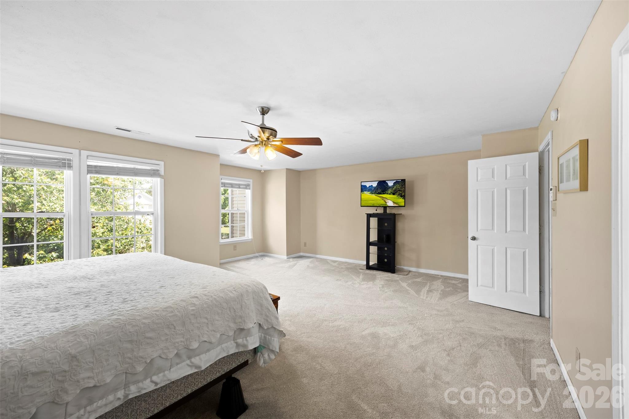 1720 Grove Tree Lane Clover, SC 29710 - Photo 32 of 43 a view of a bedroom with window and ceiling fan