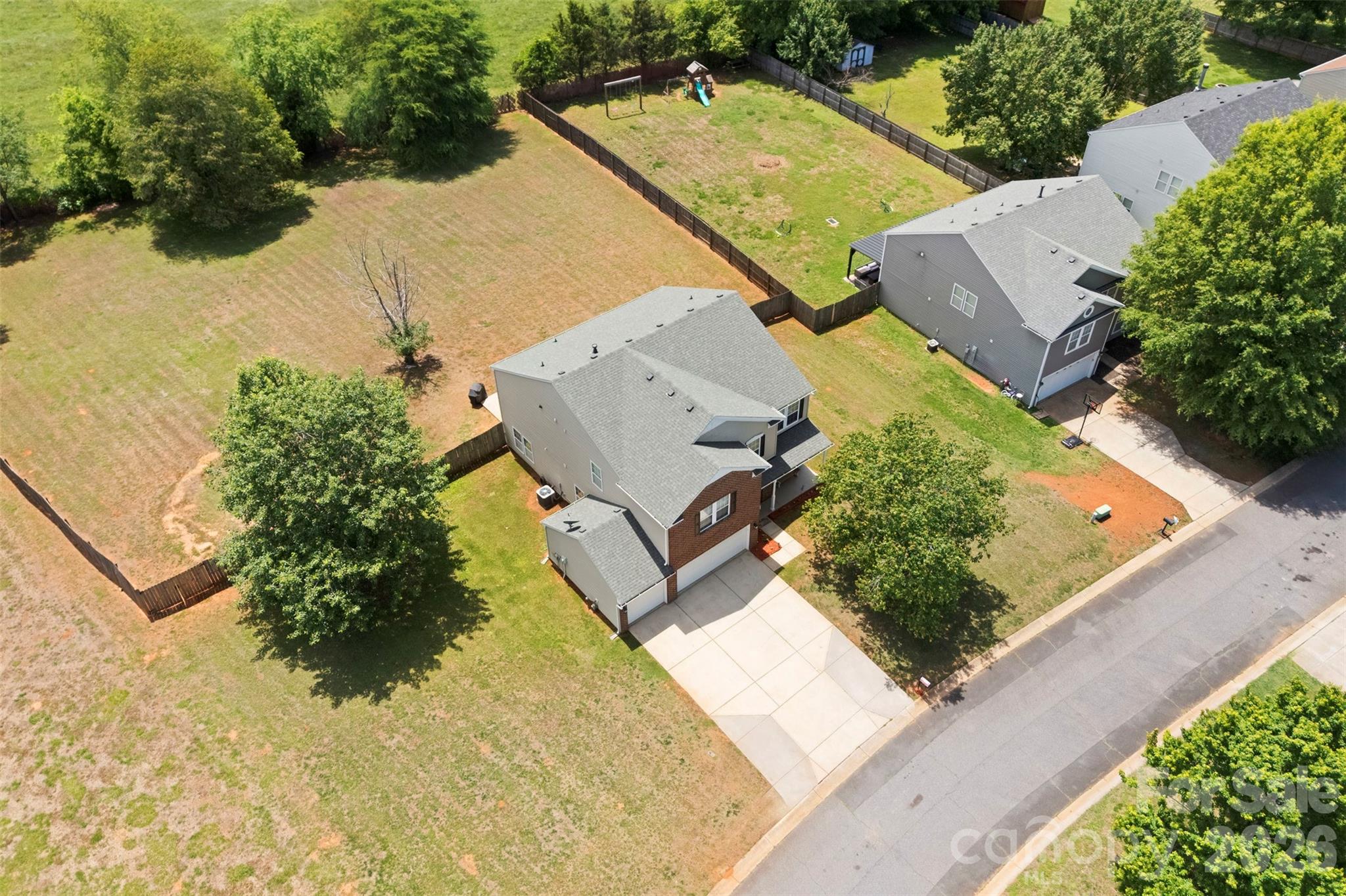 1720 Grove Tree Lane Clover, SC 29710 - Photo 39 of 43 an aerial view of a house with a yard and lake view