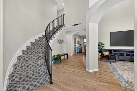 a view of entryway with wooden floor