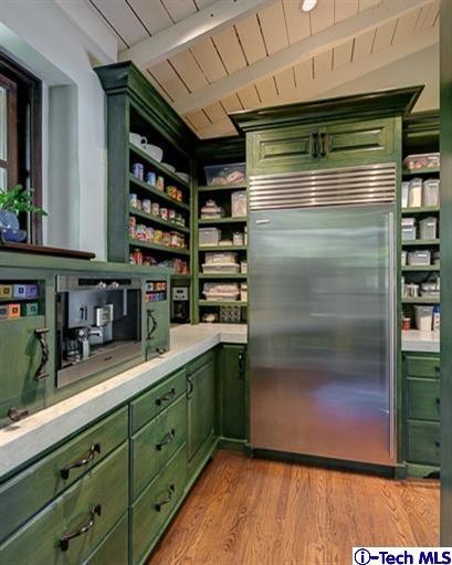 348 Blythe Road La Canada Flintridge, CA 91011 - Photo 14 of 51 a kitchen with stainless steel appliances cabinets and a wooden floor