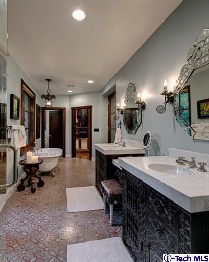 348 Blythe Road La Canada Flintridge, CA 91011 - Photo 24 of 51 a living room with furniture a table and kitchen view