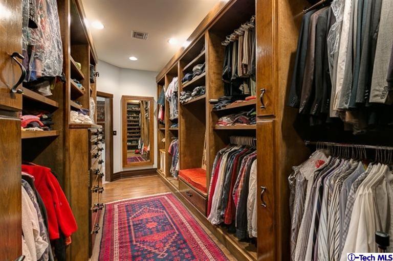 348 Blythe Road La Canada Flintridge, CA 91011 - Photo 25 of 51 a view of walk in closet with clothes and shoes