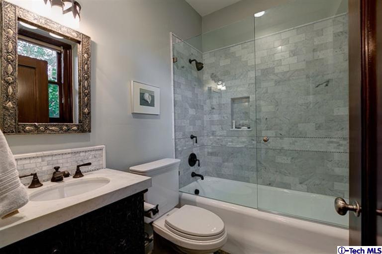348 Blythe Road La Canada Flintridge, CA 91011 - Photo 29 of 51 a bathroom with a bathtub shower sink vanity mirror and toilet