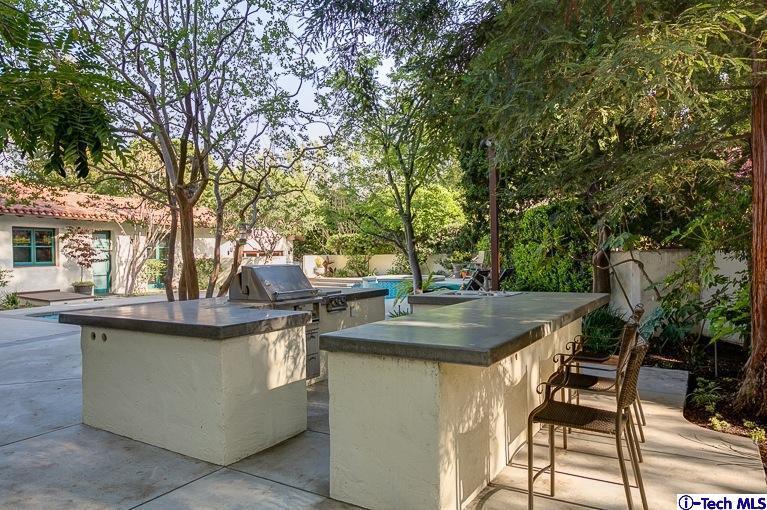 348 Blythe Road La Canada Flintridge, CA 91011 - Photo 41 of 51 a view of a wooden chairs and table in the patio