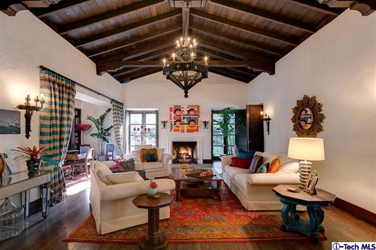 348 Blythe Road La Canada Flintridge, CA 91011 - Photo 6 of 51 a living room with furniture a fireplace and a chandelier