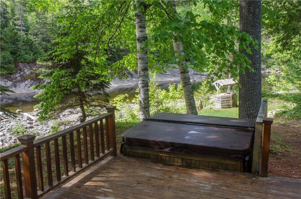 1032 Poplar Stream Road Kingfield, ME 04947 - Photo 5 of 26 Hot tub on deck overlooking the...