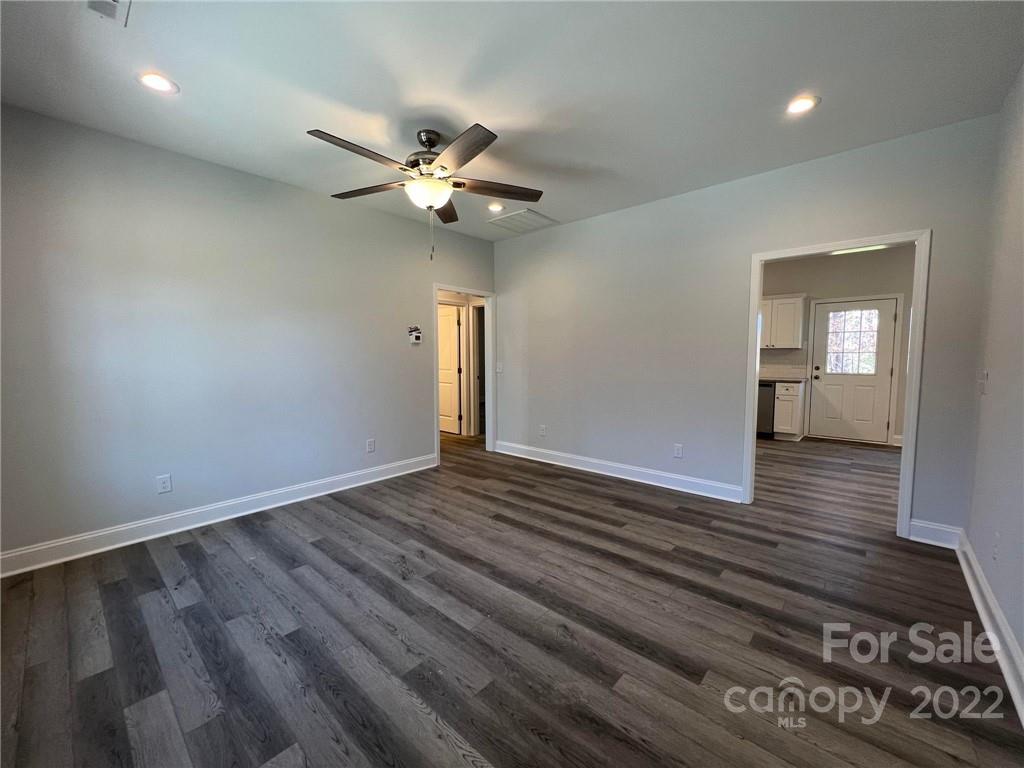 508 Willow Road Salisbury, NC 28147 - Photo 10 of 17 wooden floor in an empty room with a window