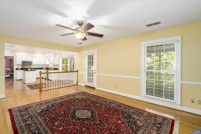 a view of a livingroom with wooden floor