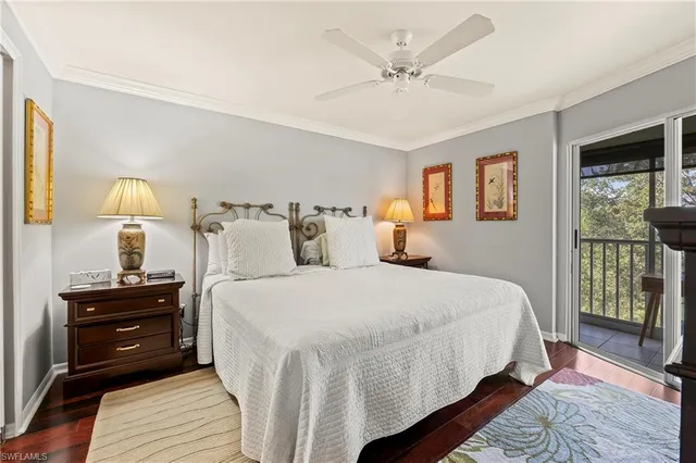 a bedroom with a bed a dresser and a window