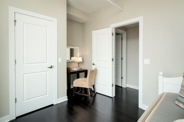 720 West Randolph Street, Unit PH7 Chicago, IL 60661 - Photo 15 of 18 a view of a bedroom with furniture and wooden floor