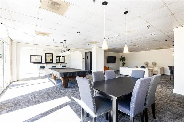 a view of a dining room with furniture