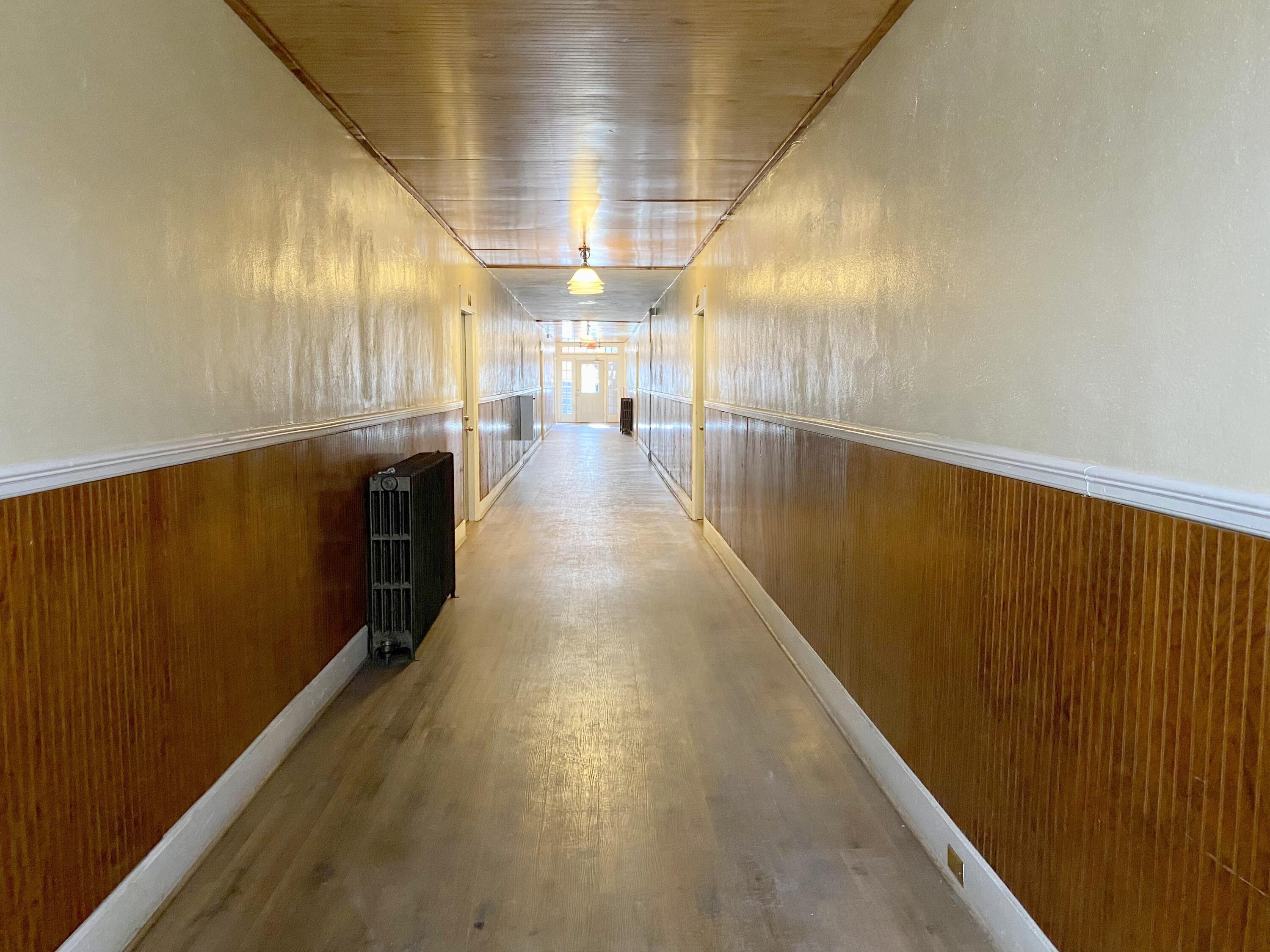 202 Elm Avenue, Unit A6 Roanoke, VA 24016 - Photo 8 of 19 a view of a hallway with wooden floor