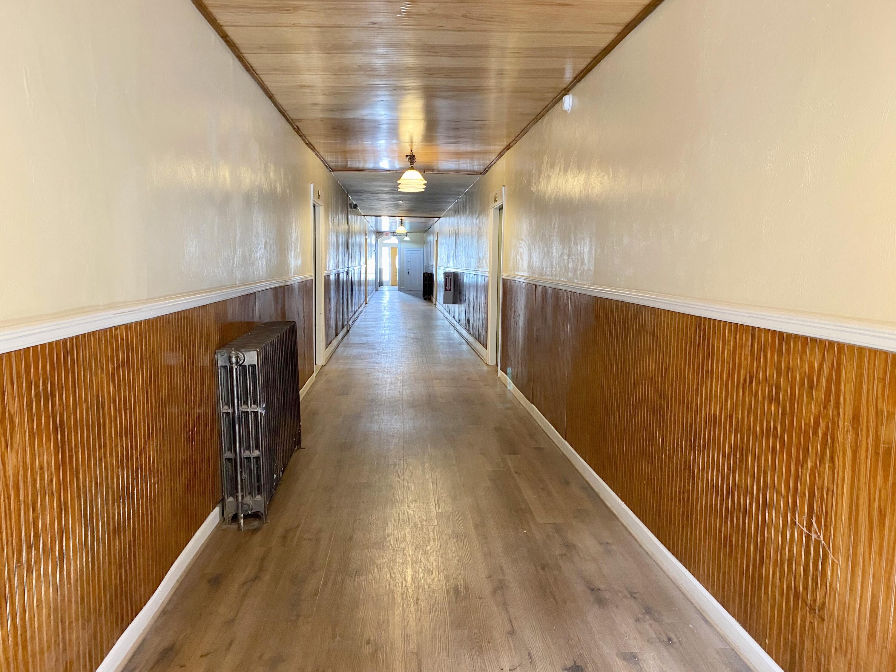 202 Elm Avenue, Unit A6 Roanoke, VA 24016 - Photo 9 of 19 a view of gallery with wooden floor