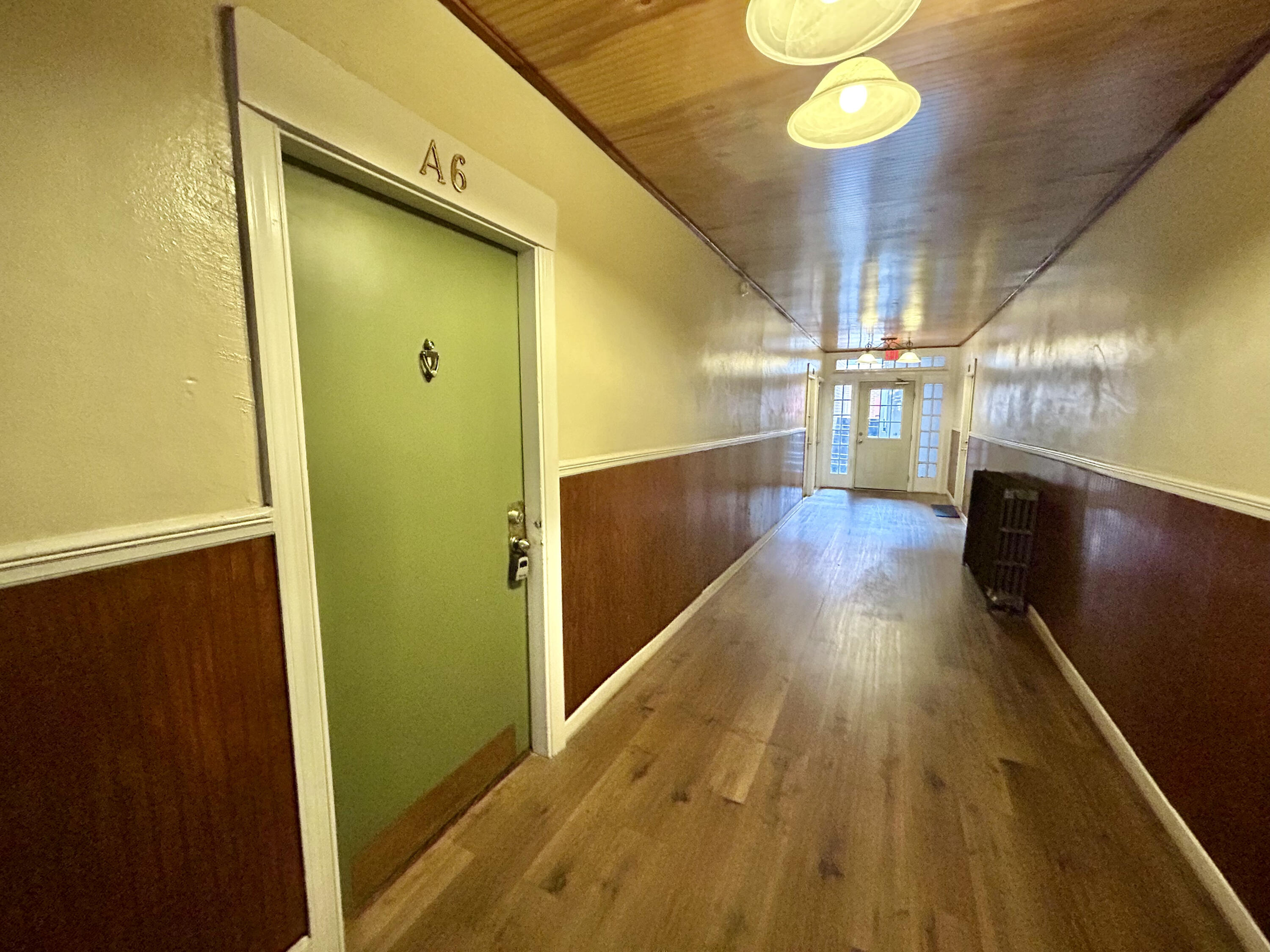 202 Elm Avenue, Unit A6 Roanoke, VA 24016 - Photo 10 of 19 a view of gallery with wooden floor