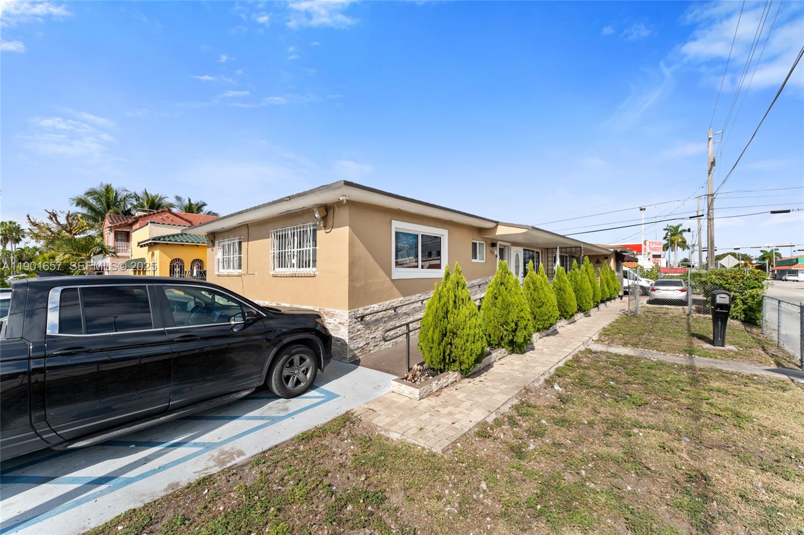 820 Southwest 17th Avenue, Unit 1 Miami, FL 33135 - Photo 1 of 19 a view of a house with a patio