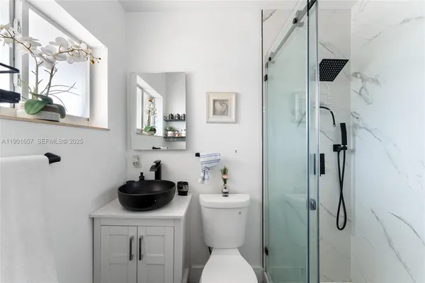 a backyard of a house with seating space