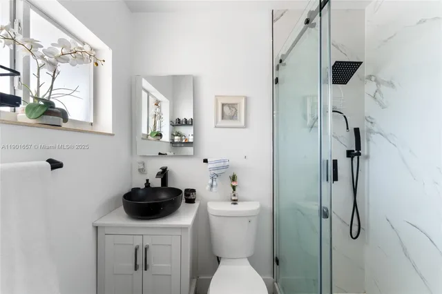 a backyard of a house with seating space