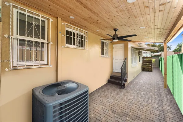 a view of storage and utility room with washer and dryer