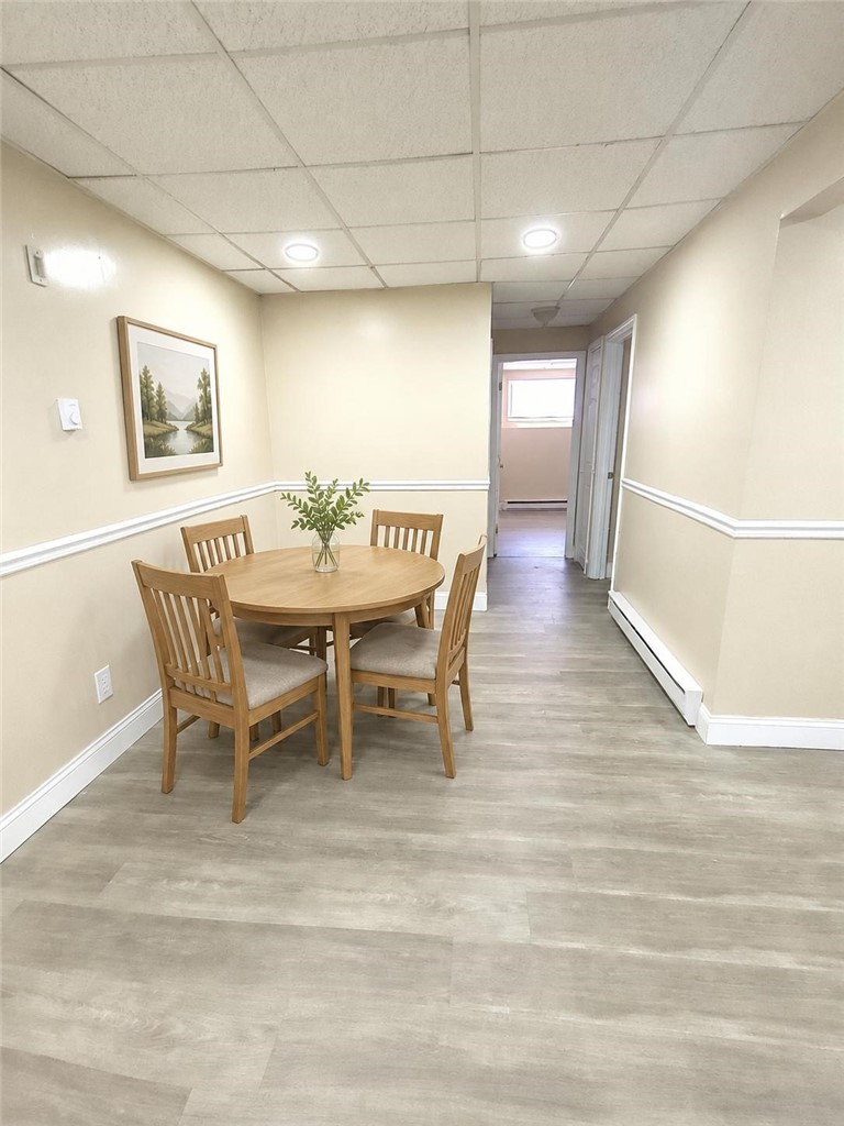 300 Smithfield Avenue, Unit P217 Pawtucket, RI 02860 - Photo 7 of 13 Virtually staged dining area