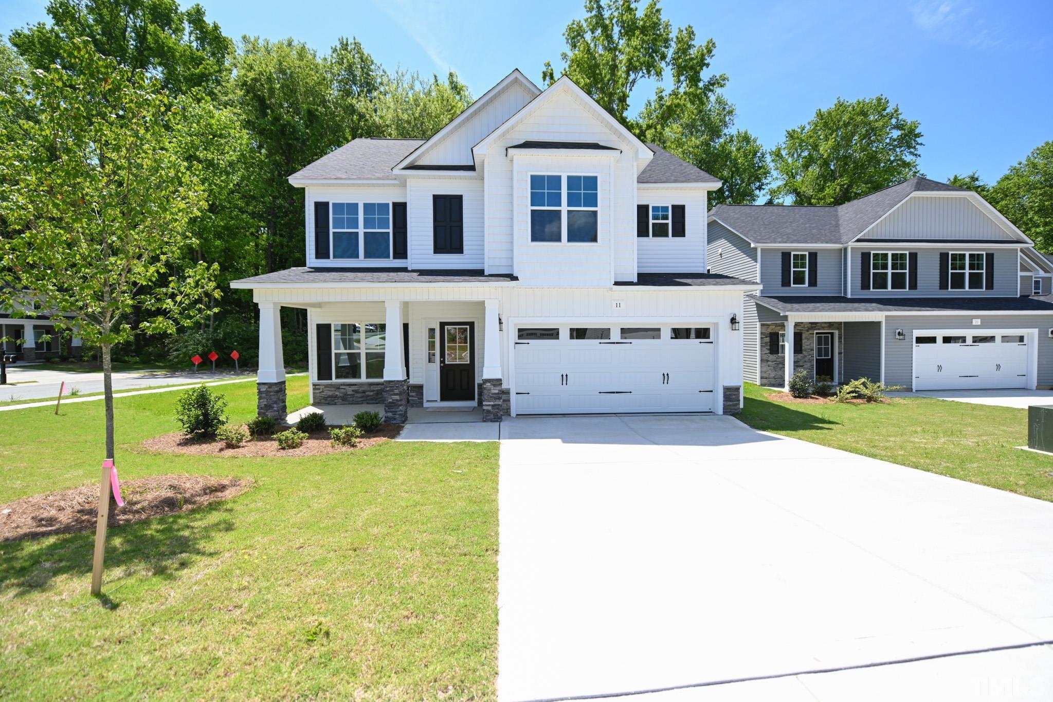 11 Kevin Troy Court Angier, NC 27501 - Photo 1 of 35 a view of house with swimming pool outdoor seating and yard