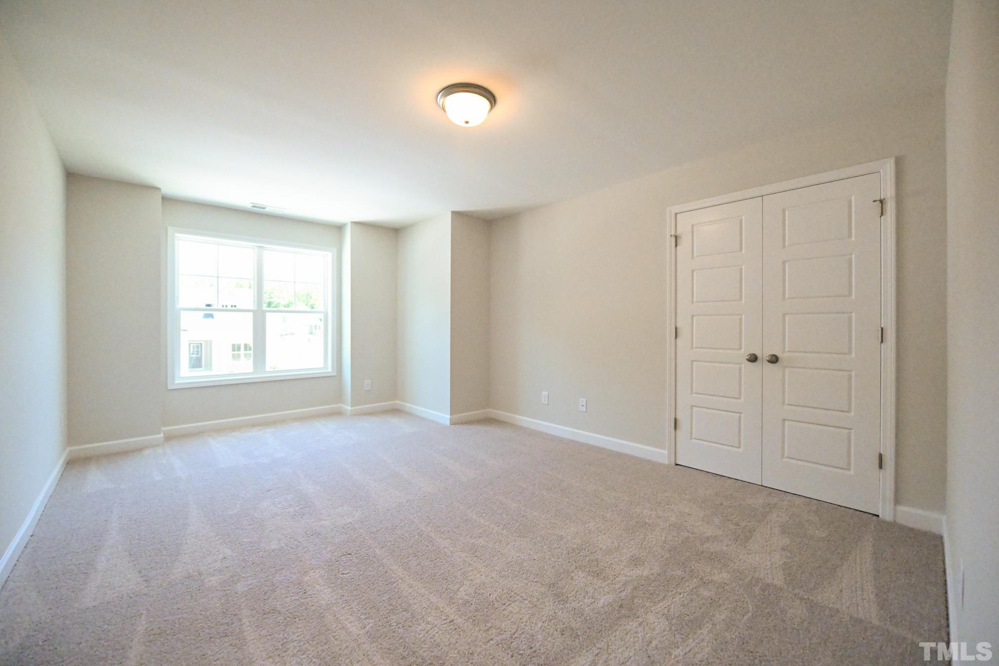 11 Kevin Troy Court Angier, NC 27501 - Photo 27 of 35 a view of an empty room with a window