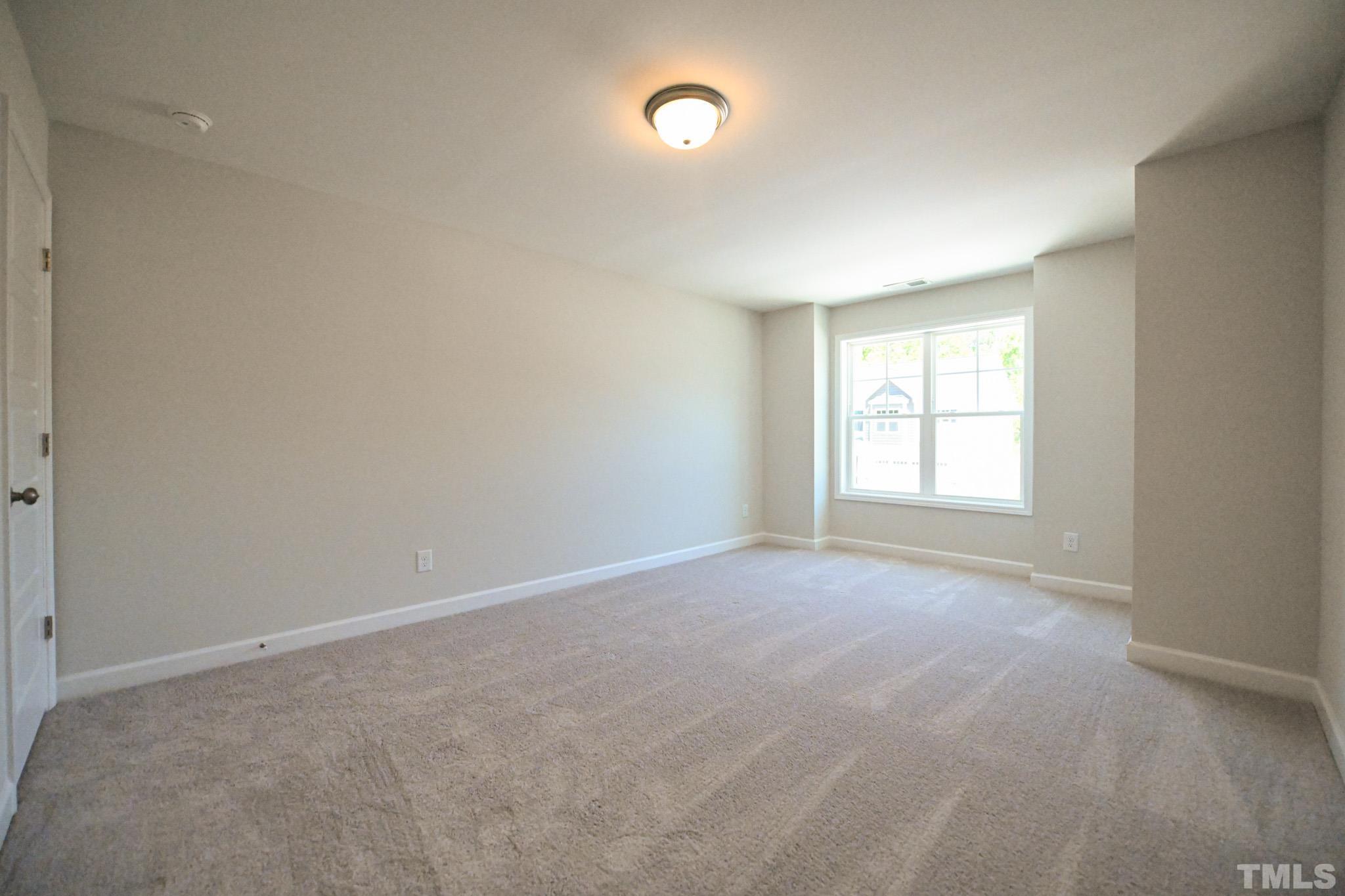 11 Kevin Troy Court Angier, NC 27501 - Photo 28 of 35 an empty room with windows