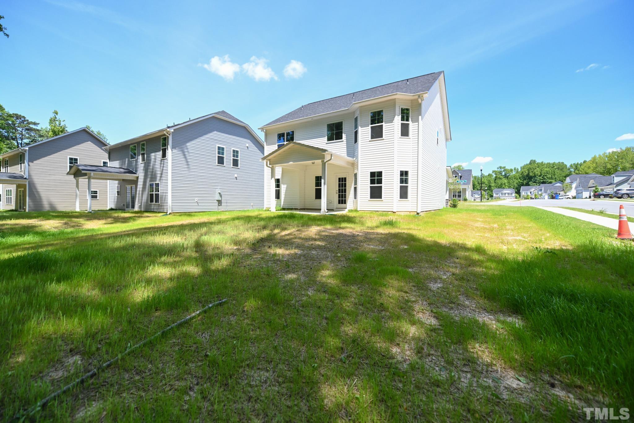 11 Kevin Troy Court Angier, NC 27501 - Photo 35 of 35 a front view of a house with a garden