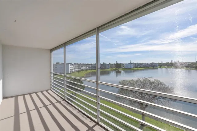 a view of a balcony with lake view