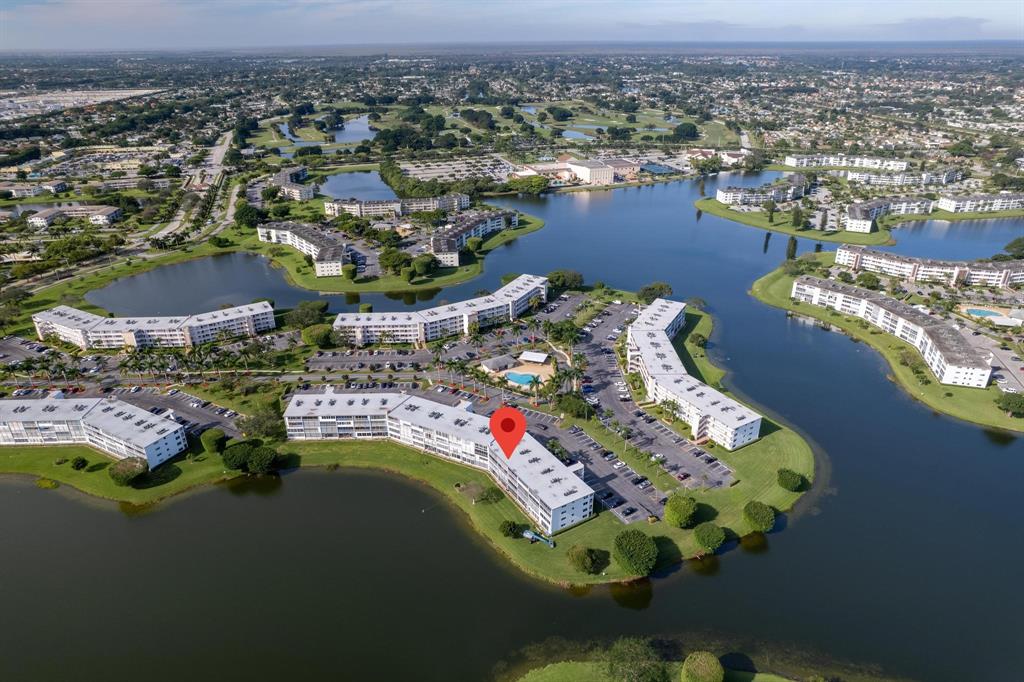 4036 Cornwall East, Unit 4036 Boca Raton, FL 33434 - Photo 24 of 30 an aerial view of a house with a lake view