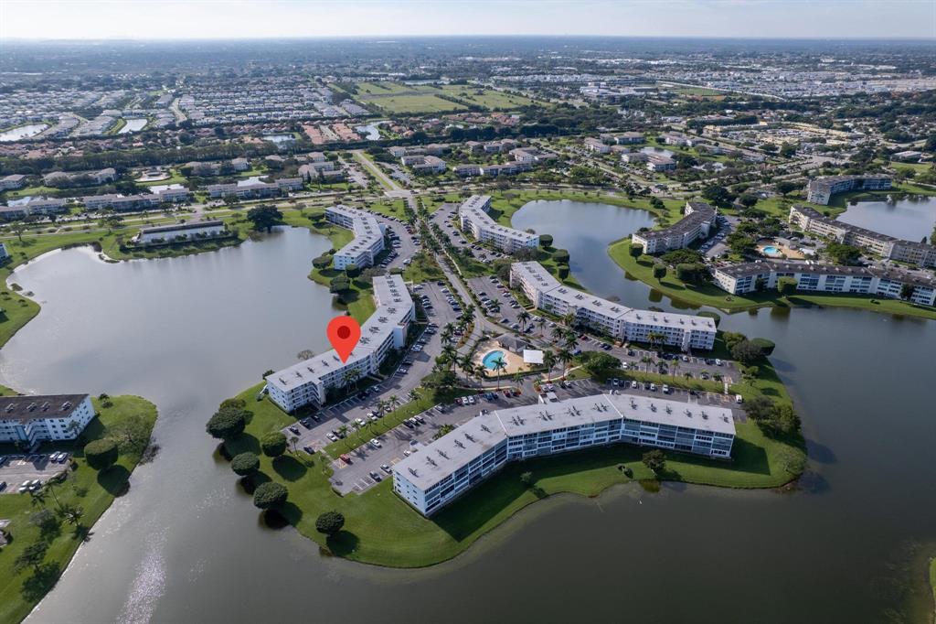 4036 Cornwall East, Unit 4036 Boca Raton, FL 33434 - Photo 27 of 30 an aerial view of a house with a lake view