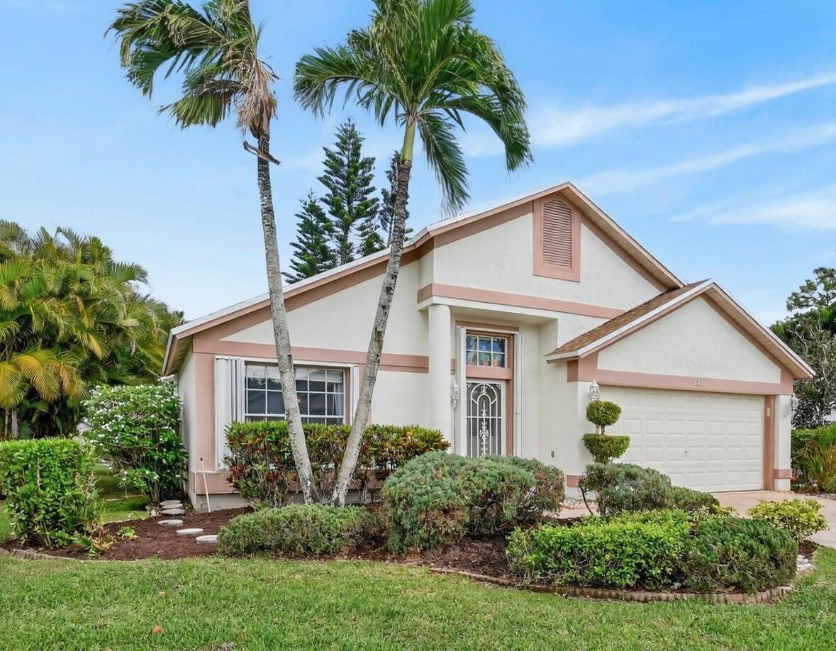 131 Hammocks Court Greenacres, FL 33413 - Photo 3 of 38 front