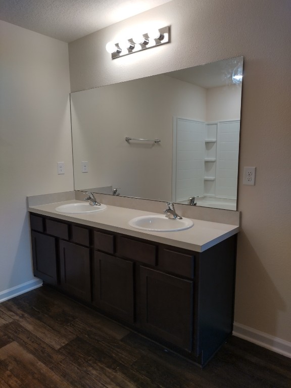 75378 Bridgewater Drive Yulee, FL 32097 - Photo 14 of 33 a bathroom with a double vanity sink and a mirror