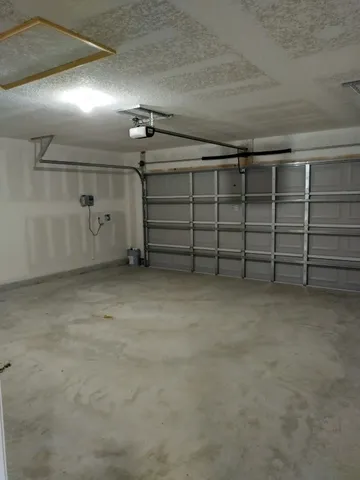 a view of a park with swings and slides