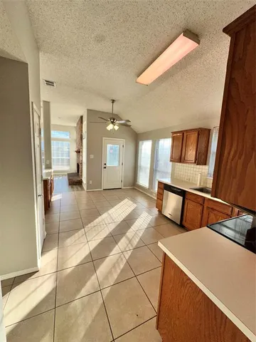 a lobby with furniture and window