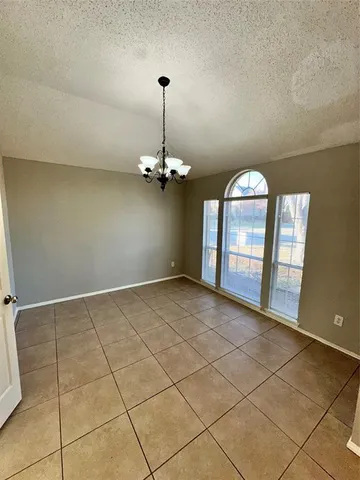 a view of a livingroom with a chandelier