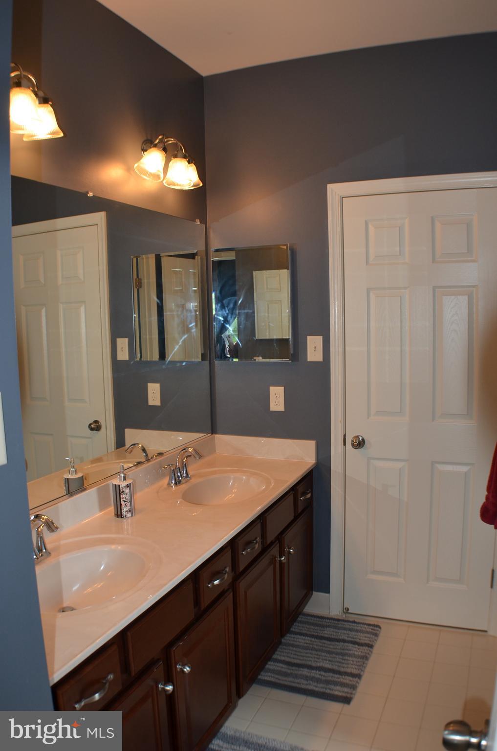 9802 Shaded Day Laurel, MD 20723 - Photo 20 of 39 Bath shared between Bedrooms 2 & 3