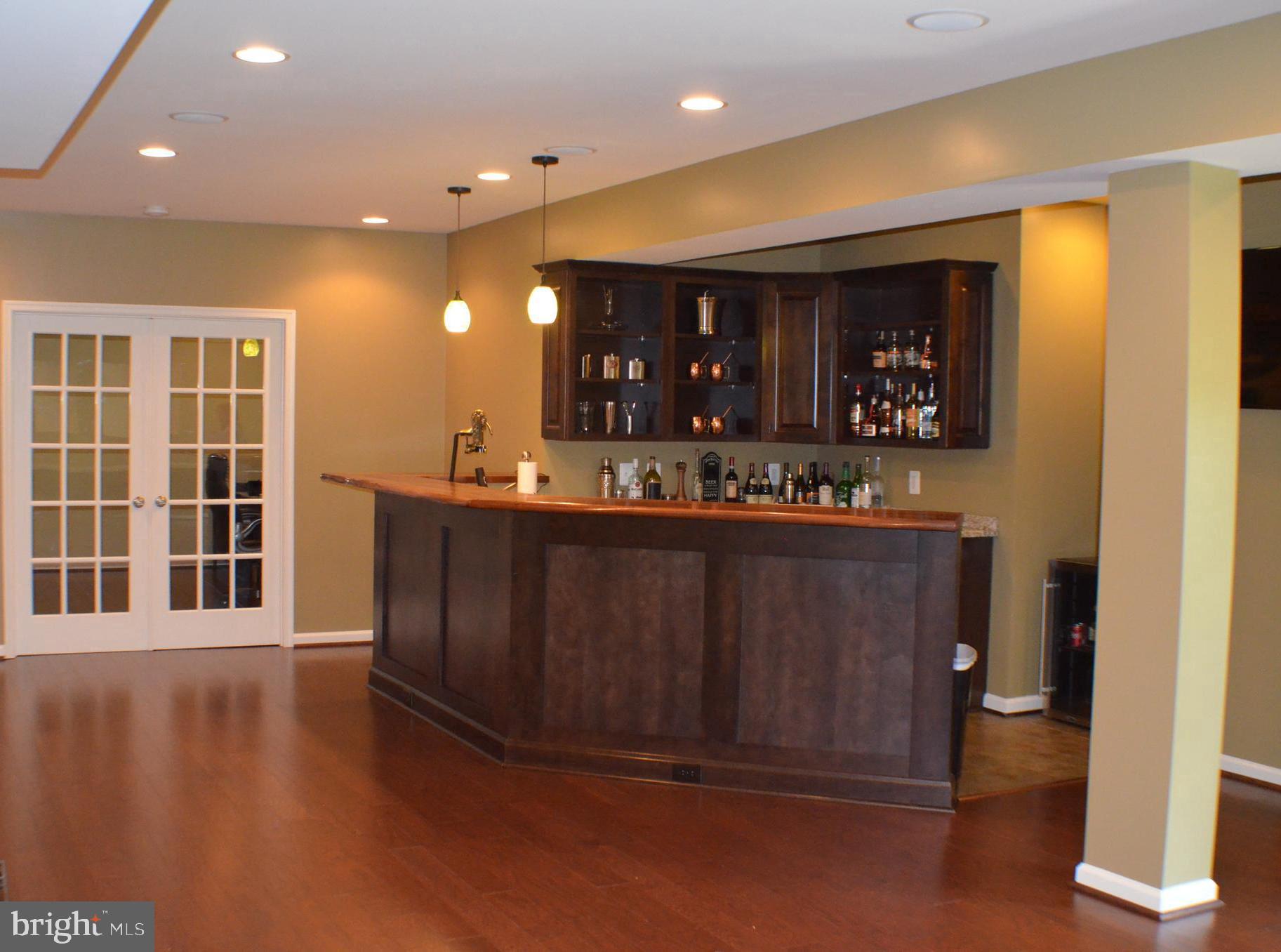 9802 Shaded Day Laurel, MD 20723 - Photo 25 of 39 Recreation Room with gorgeous Walnut Bar