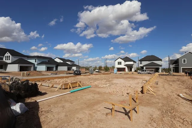 a view of a house with snow on the ground