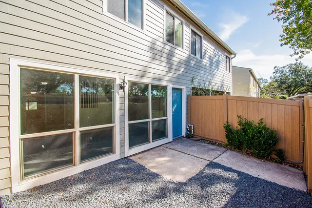 a view of backyard with green space