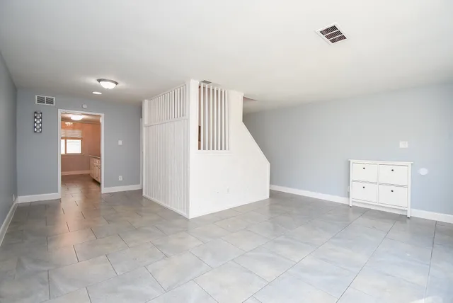 an empty room with a natural light