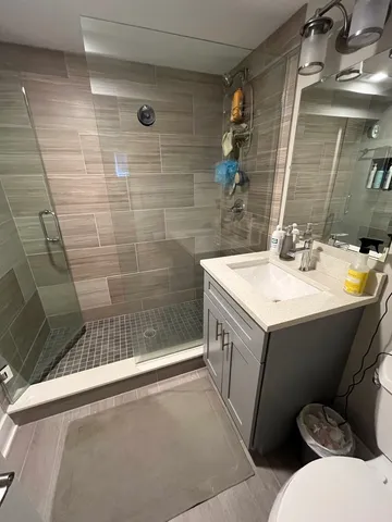 a bathroom with a sink and mirror
