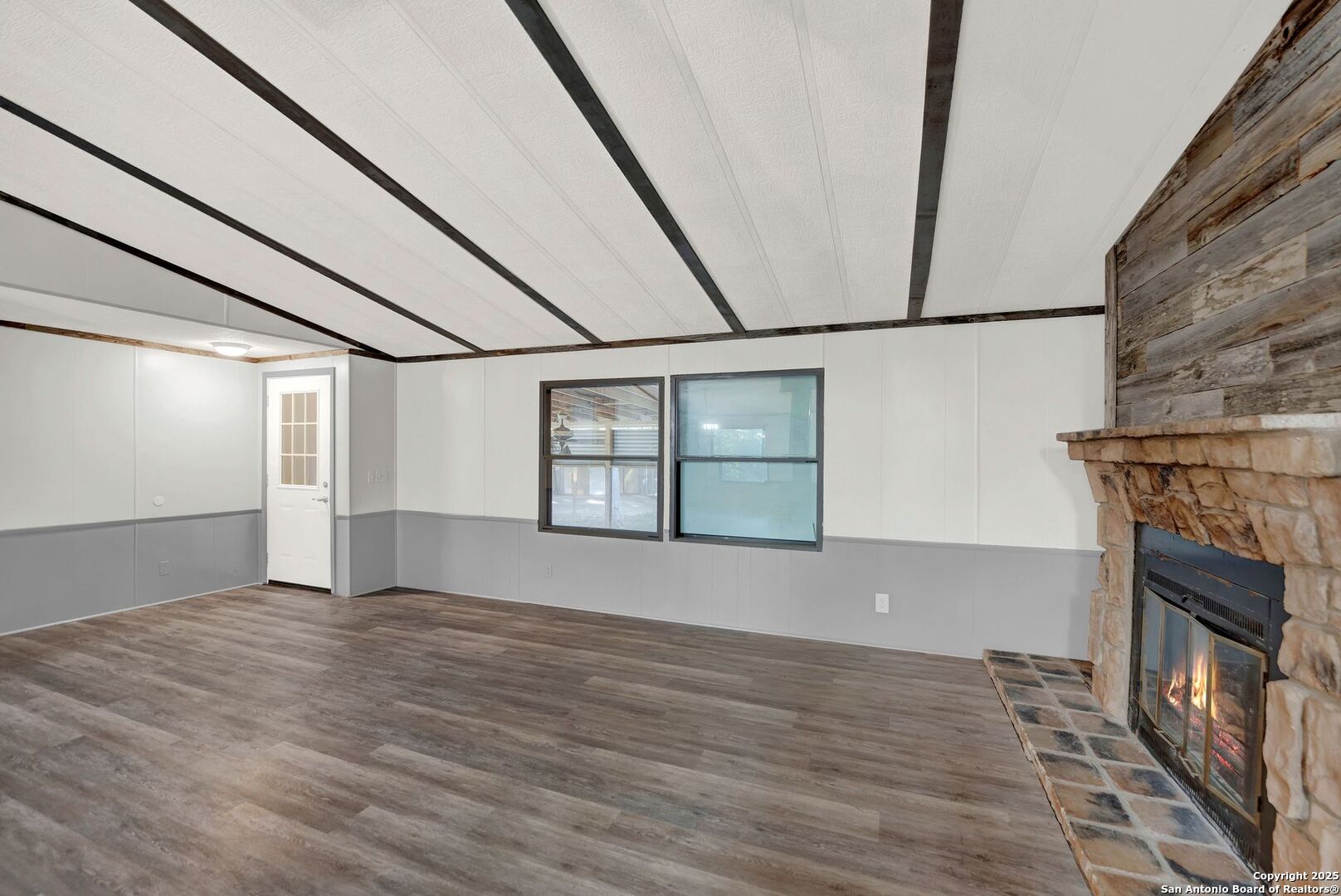245 Bandera Drive Bandera, TX 78003 - Photo 13 of 37 a view of empty room with wooden floor
