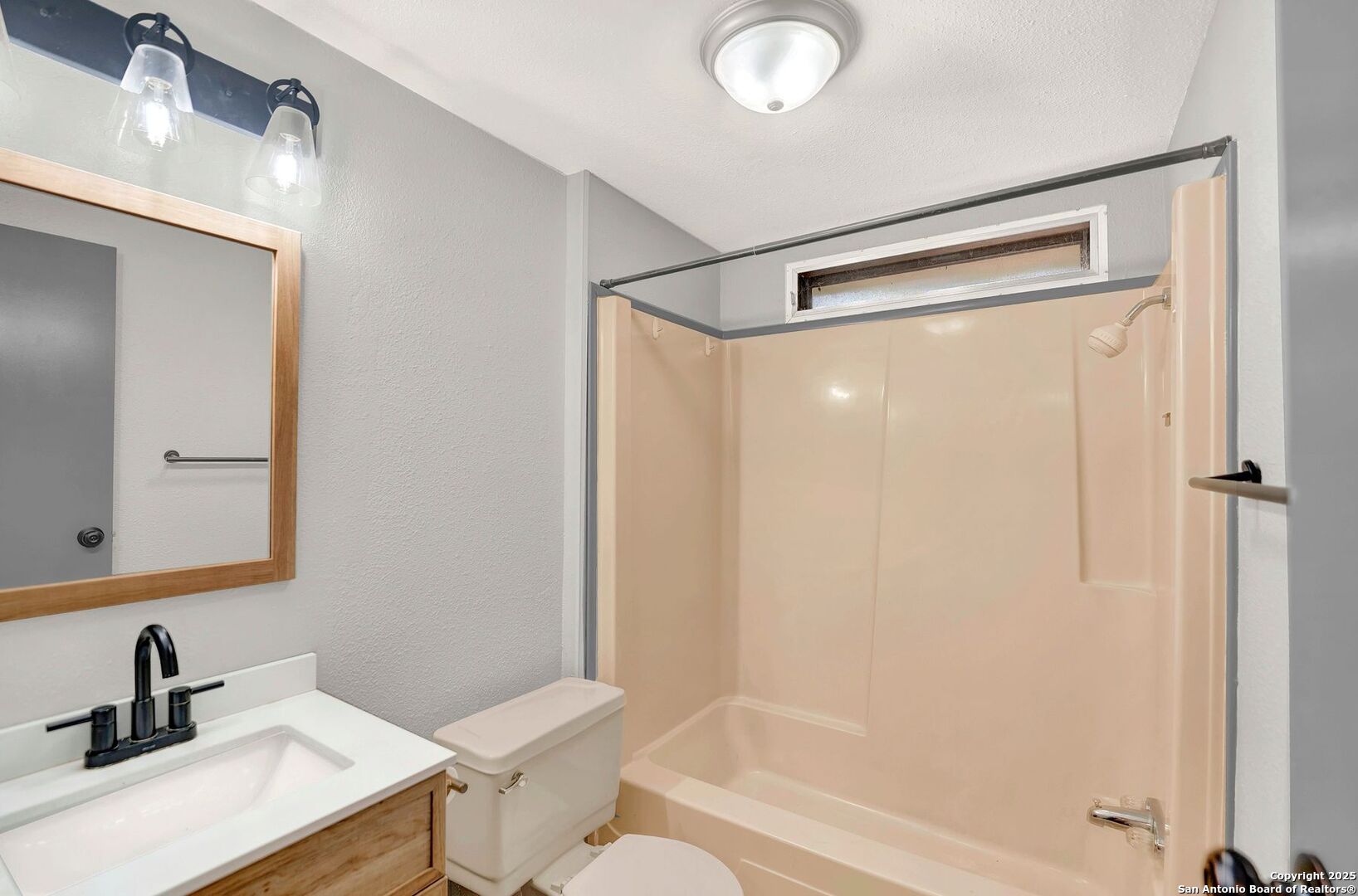 245 Bandera Drive Bandera, TX 78003 - Photo 29 of 37 a bathroom with a shower and a sink