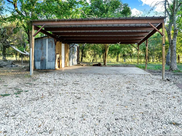 a view of backyard with green space