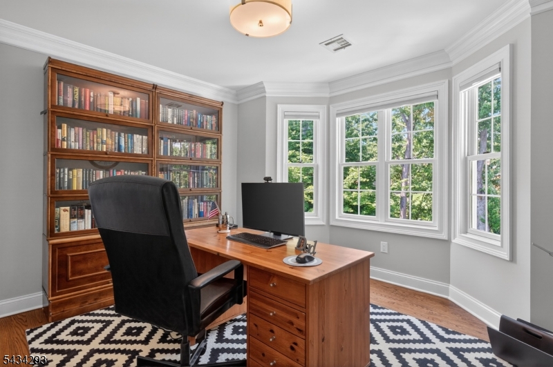 921 Harding Street Westfield, NJ 07090 - Photo 28 of 50 a view of a workspace with furniture and a window