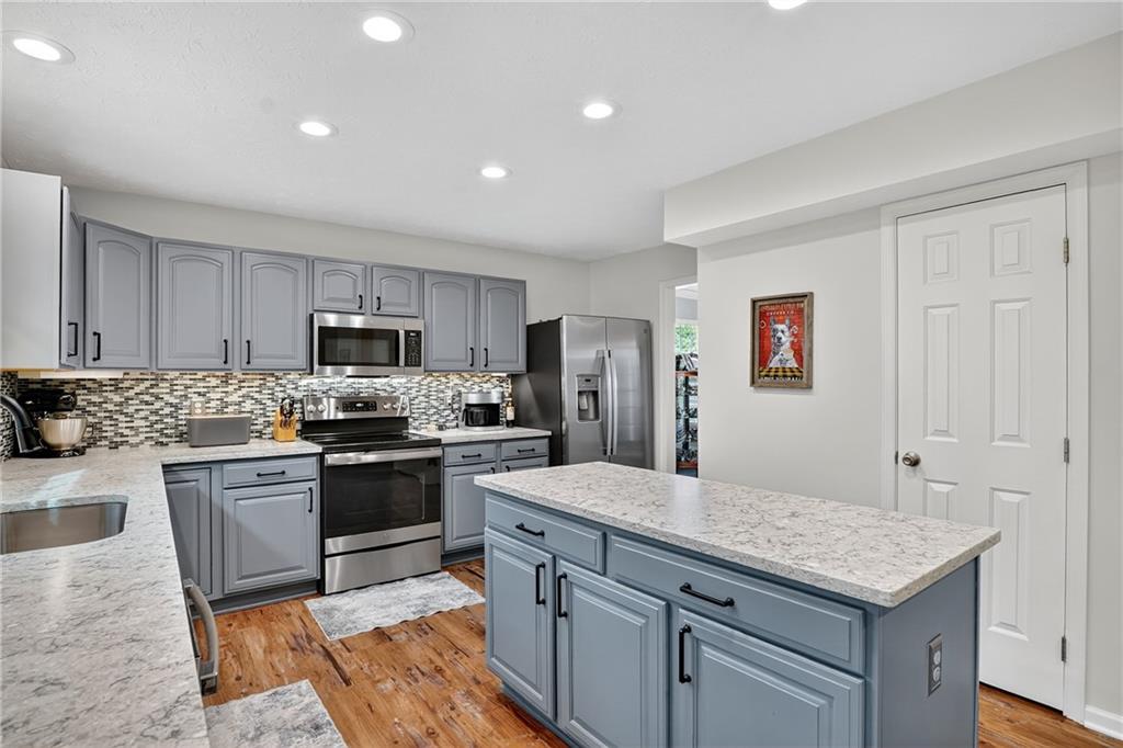 224 Field Club Circle McKees Rocks, PA 15136 - Photo 12 of 41 a kitchen with granite countertop cabinets stainless steel appliances and a counter space