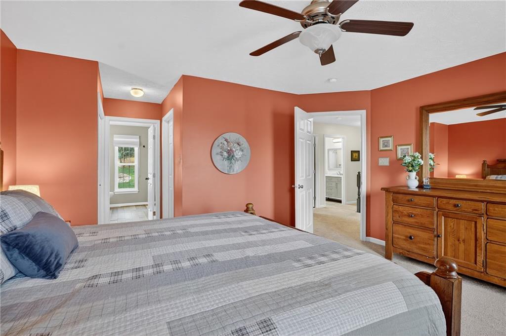224 Field Club Circle McKees Rocks, PA 15136 - Photo 19 of 41 a bedroom with a large bed and a dresser